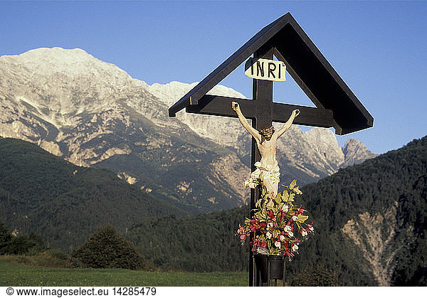 crucifix in resia valley  alpi giulie park  italy