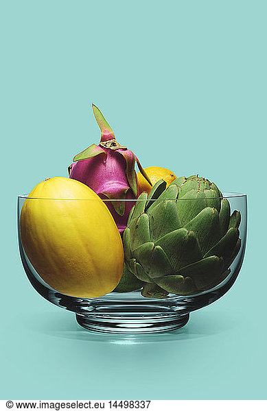Crystal Bowl Filled with Artichoke  Melon  Dragon Fruit and Lemon