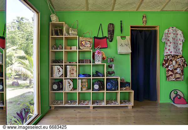 Cubby Shelving Against Green Wall