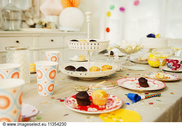 Cupcakes and decorations on birthday party table