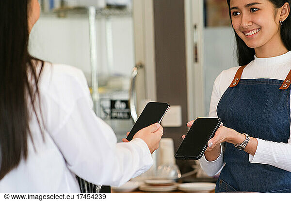 Customer making payment using NFS technology