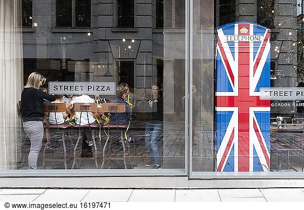 Customers Inside Gordon Ramsay?.s Street Pizza Restaurant  London  England.