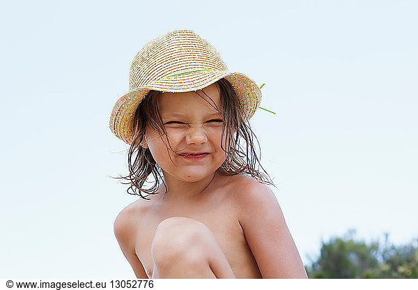 Cute girl in sun hat  portrait  Scopello  Sicily  Italy