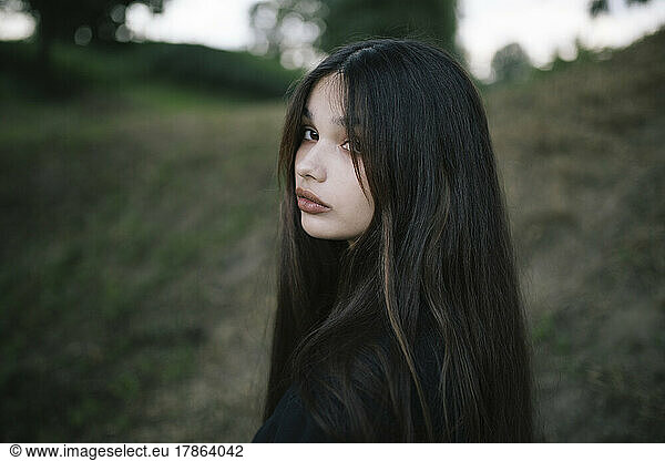 cute gothic long haired brunette woman