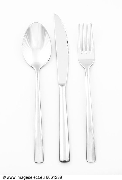 Cutlery on white background  close-up