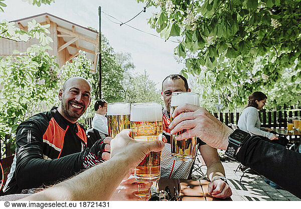 Cyclists drinking a beer in the middle of the route  Germany