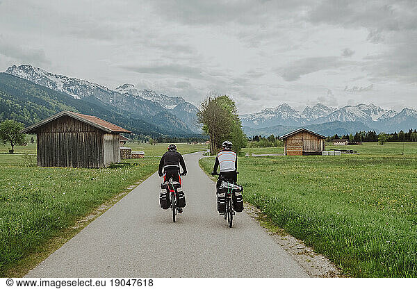 Cyclists ride his bikes in Fussen  Germany