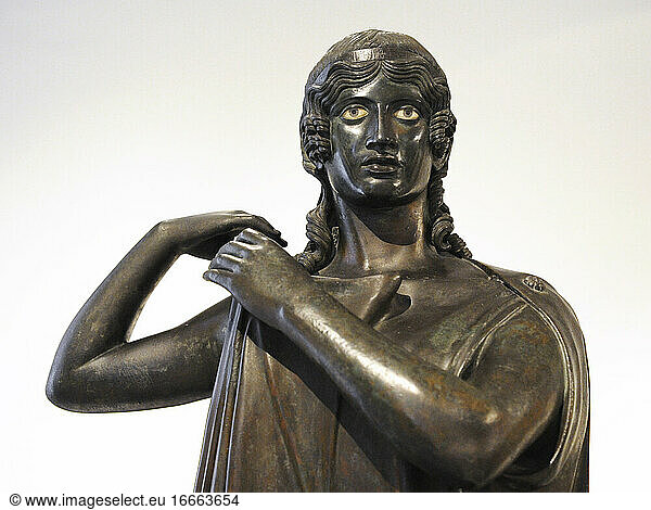 Dancer or Hydrophora (water-bearer). Statue. Bronze. 1st century BC. Part of the great peristyle of the Villa of the Papyri  Herculaneum. National Archaeological Museum. The Village of the Papyri. Naples. Italy.
