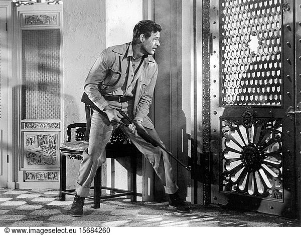 David Farrar  on-set of the Film  'Escape to Burma'  RKO Radio Pictures  1958