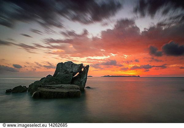 Dawn on reefs of Punta Molenti beach  Villasimius  Sardinia  Italy
