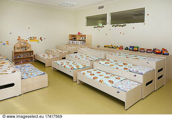 Day care nursery or pre-school kindergarten bedrooms for nap time  pull out bunks