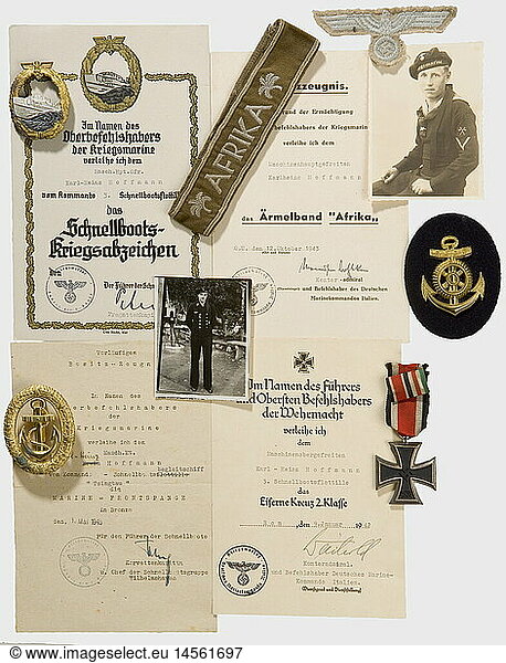 Decorations and documents  for a machinist's mate in the 3rd E-Boat Flotilla 1st model E-Boat War Badge  patinaed non-ferrous metal with a fire-gilt wreath and silver-plated ship. The raised edges polished. Made by 'Schwerin Berlin 68'. Waisted transverse pin. Fastening hook. Award certificate with the depiction of a ship with Ship's Commander Rudolf Petersen's ink signature. Iron Cross 2nd Class with ribbon  and the citation for 9 January 1942 with the ink signature of Rear Admiral  and Commander of the German Navy in Italy  Weichold. 'Afrika' sleeve band (tailor made  camel hair version  length 33 cm) with the certificate for 12 October 1943 with the ink signature of Rear Admiral  and Commander of the German Navy in Italy historic  historical  1930s  20th century  navy  naval forces  military  militaria  branch of service  branches of service  armed forces  armed service  object  objects  stills  clipping  clippings  cut out  cut-out  cut-outs