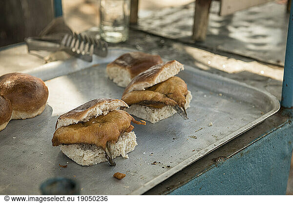 Deep Fried Fish Sandwiches on a Tray Ready to be Sold on a Cuban Food Cart. Santa Clara  Villa Clara  Cuba