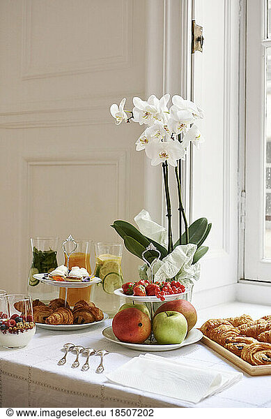 Delicious breakfast spread in sophisticated Parisian apartment