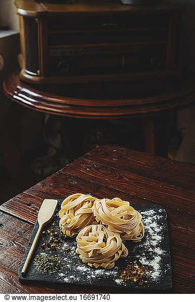 Delicious fresh Italian pasta  fettuccini with spices.