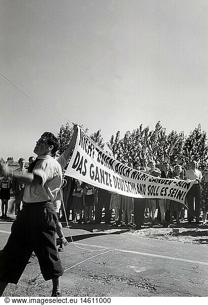 demonstrations  Germany  demonstrators for a united Germany with banner  zonal border  late 1940s