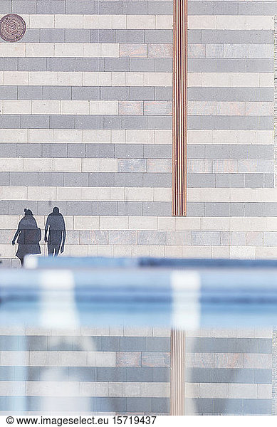 Denmark  Aarhus  Shadows of two pedestrians seen from above