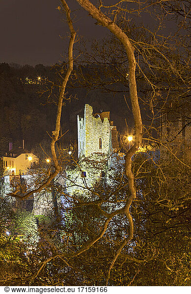 Dent Creuse seen through branches at night Luxembourg City  Luxembourg