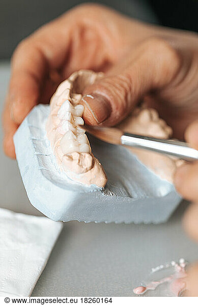 Dental Technician Making Ceramic Crowns