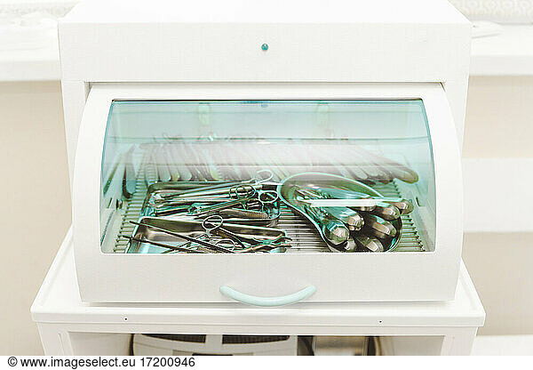 Dental tools being disinfected in autoclave