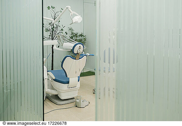 Dentist's chair in medical examination room
