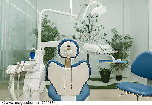 Dentist's chair with equipment in clinic