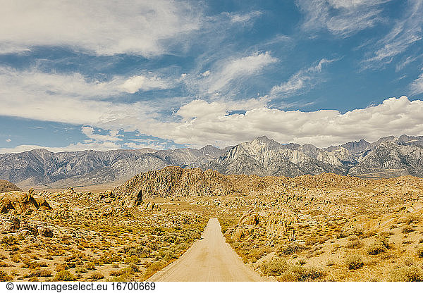 Deserted road near foothills of Alabama Hills in northern Califonia.