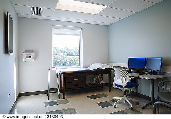 Desktop computers in medical examination room at hospital