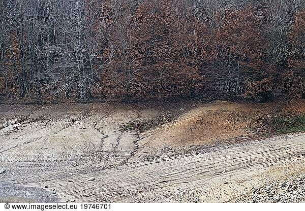 Desolate landscape of drought in the Santa Fe reservoir in the Montseny Biosphere Reserve in the province of Barcelona in Spain