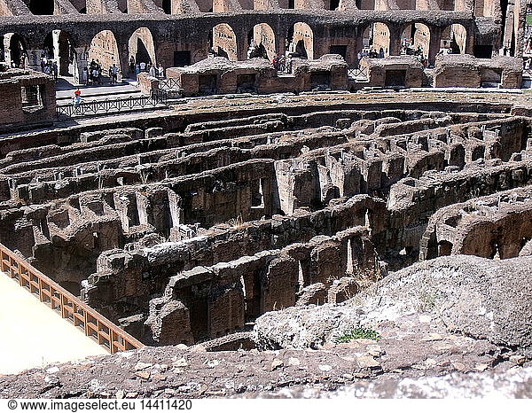 Detail from the Roman Collosseum (also known as the Flavian Amphitheatre)  an elliptical amphitheatre in the centre of Rome  Italy. Considered one of the greatest works of Roman architecture and engineering. Built from concrete and stone  with construction starting under the emperor Vespasian in 70 AD  finished in 80 AD under Titus. The amphitheatre also underwent modifications during the reign of Domitian. Named for its association with the Flavius family name of which these 3 emperors belonged. The Collosseum seated 50 000 spectators to view gladiatorial contests and performances. It was later repurposed for many other uses. One of the outstanding physical representations of Imperial Rome.