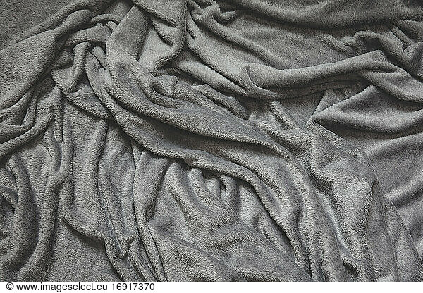 Detail of crumpled grey velvet fabric