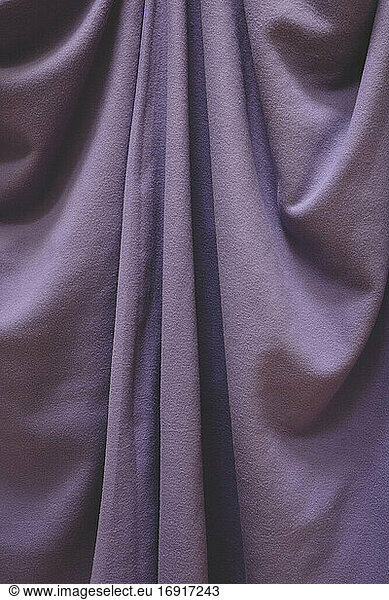 Detail of draped fleece blanket with folds and creases