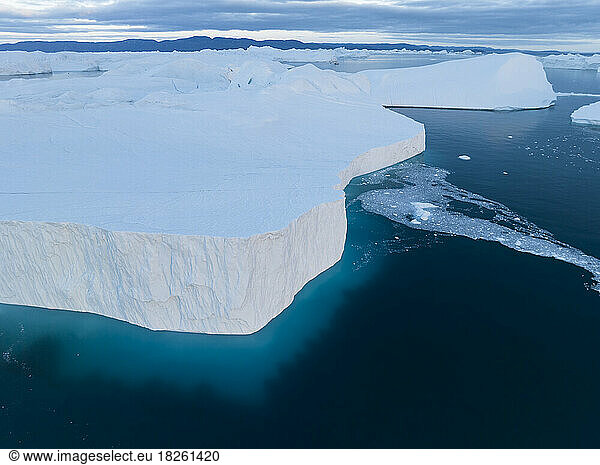 detail of extreme icebergs from aerial view
