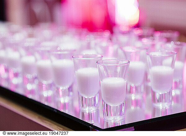 Detail of milk shots on tray in moroccan traditional wedding.
