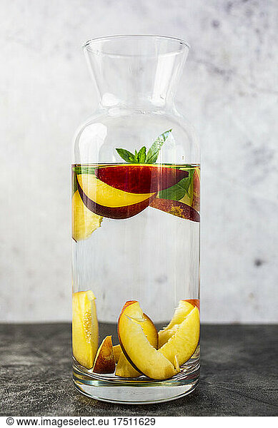Detox water with peaches and mint