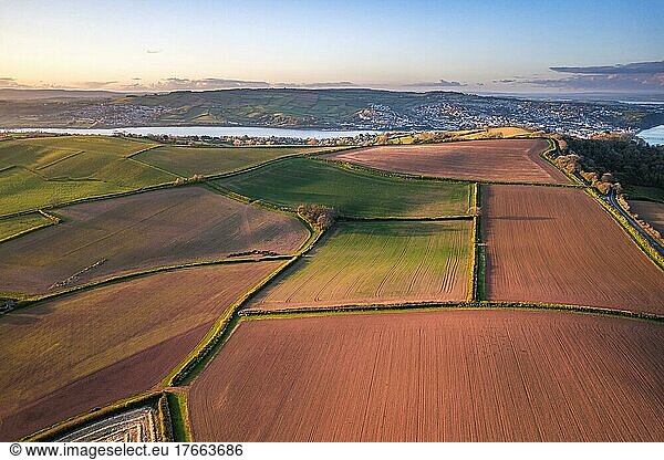 Devon Fields and Farmlands at sunset time from a drone over Shaldon and Teignmouth from Labrador Bay  Devon  England  EuropeTop Down over Fields and Farmlands over English Village  Shaldon  Devon  England  Europe
