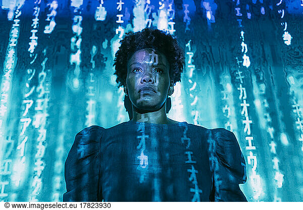Digital code falling on woman