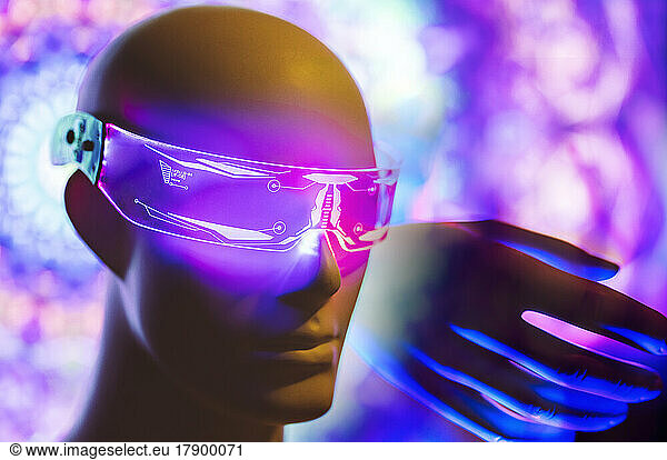 Digitally generated image of robot wearing futuristic eyeglasses