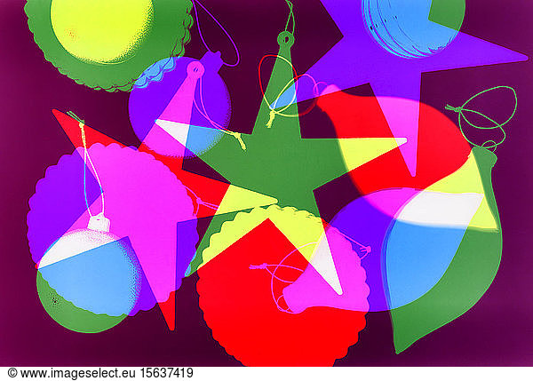Digitally generated image of various Christmas decorations on magenta background