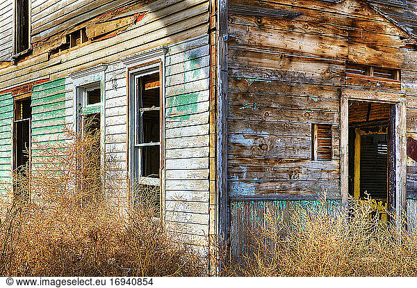 Dilapidated deserted wooden building.