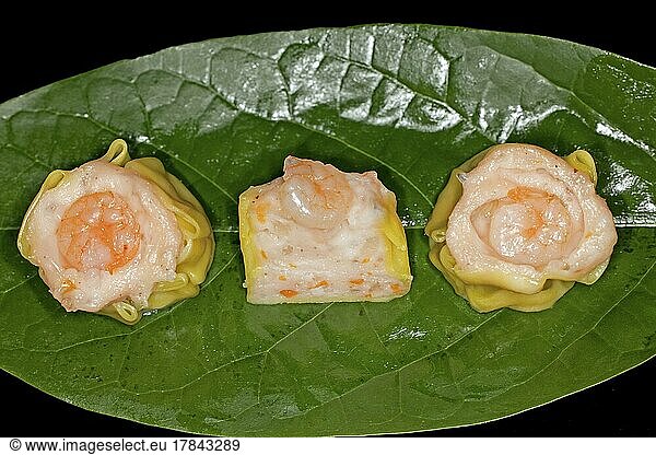 Dim Sum with fish farce and prawns  food photography with black background