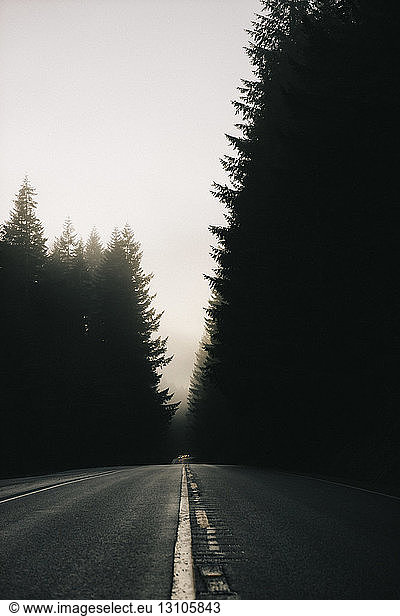 Diminishing perspective on highway 26 at dusk; Oregon  United States of America