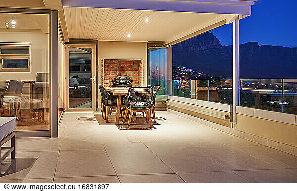 Dining table on luxury home showcase patio at night