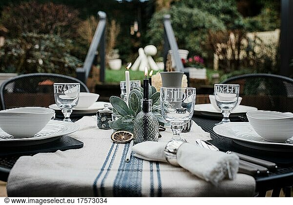 dinner table decorations for a celebration in the garden