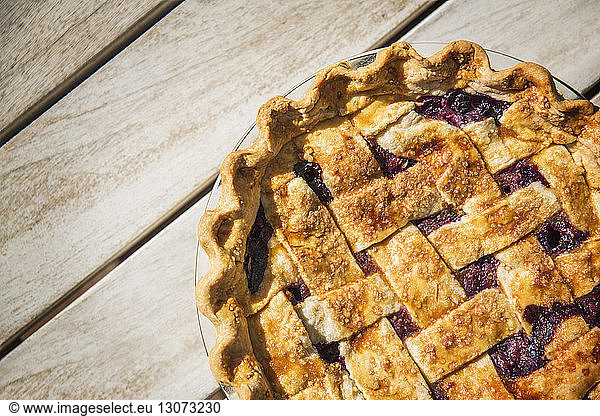 Directly above shot of pie on wooden table