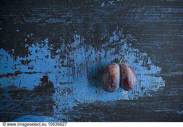 Directly above shot of plums on table