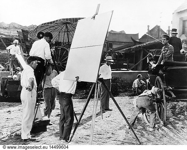 Director Clarence Brown  (left)  John Gilbert  (in carriage)  on-set of the Silent Film Flesh and the Devil  1926