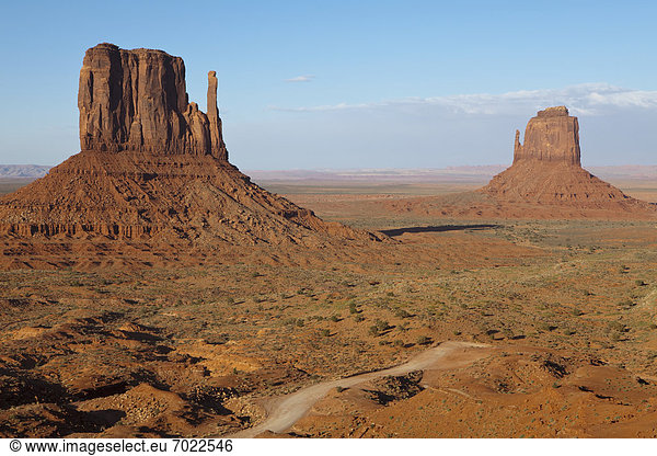Dirt Road and Mesas in the Desert