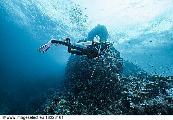 diver exploring a reef in the South Andaman Sea / Thailand