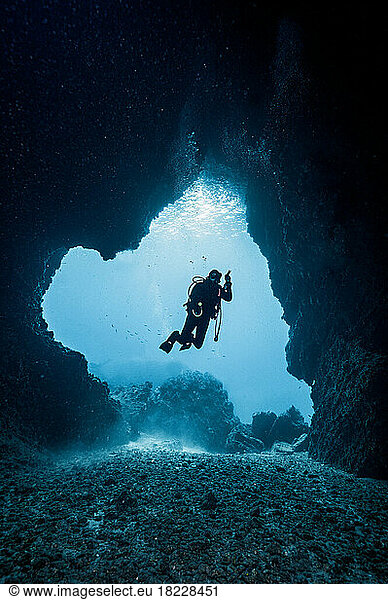 diver exploring underwater cave in the South Andaman Sea